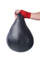 Boxing shell in hand, hanging pear, on a white background, close-up Royalty Free Stock Photo