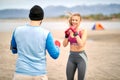 Boxing sparring boxers at beach exercise. Man and woman  sparring  together Royalty Free Stock Photo