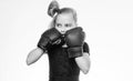 Boxing sport for female. Be strong. Girl child with blue gloves posing on white background. Sport upbringing. Upbringing