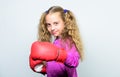 Boxing sport for female. Skill of successful leader. Sport upbringing. Girl cute child with red gloves posing on white Royalty Free Stock Photo