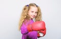 Boxing sport for female. Skill of successful leader. Sport upbringing. Girl cute child with red gloves posing on white Royalty Free Stock Photo