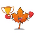 Boxing winner red maple leaf mascot cartoon Royalty Free Stock Photo