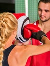 Boxing workout woman in fitness class. Sport exercise two people. Royalty Free Stock Photo