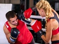 Boxing workout woman in fitness class. Sport exercise two people. Royalty Free Stock Photo