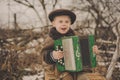 Boy with an accordion Royalty Free Stock Photo