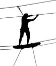 Boy in adventure park rope ladder. Strong young men in a rope park Royalty Free Stock Photo