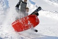 Boy in the Air While Sledding Downhill