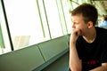 Boy in airport lounge Royalty Free Stock Photo