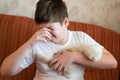 The boy is allergic to cat Royalty Free Stock Photo