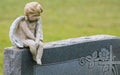 Boy angel on headstone Royalty Free Stock Photo