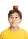 Boy with apple on his head Royalty Free Stock Photo