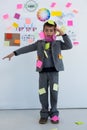 Boy as business executive with sticky notes on his body Royalty Free Stock Photo