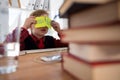 Boy as business executive with sticky notes on his eyes Royalty Free Stock Photo