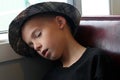 Boy Asleep In Booth Royalty Free Stock Photo