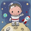 Boy astronaut on the moon on a space background