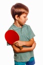 Boy athlete upset in table tennis player with racket isolated on Royalty Free Stock Photo