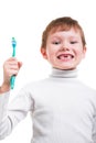 Boy without baby teeth with toothbrush Royalty Free Stock Photo