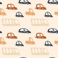 Boy background in autumn colors. Beige, orange, cream white and dark blue hand drawn cars seamless pattern. Vector cute