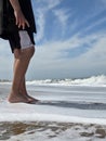 Boy background.  ocean.  beach.  rest.  relax.  man.  shorts. Royalty Free Stock Photo
