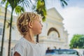 Boy on background of Old Town Hall in George Town in Penang, Malaysia. The foundation stone was laid in 1879