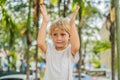 Boy on the background of palm trees Royalty Free Stock Photo