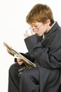 Boy in Baggy Suit Reading Newspaper