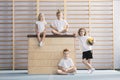 Smiling children on wooden box Royalty Free Stock Photo