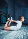 Boy ballet dancer doing exercise at dance class Royalty Free Stock Photo