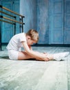 Boy ballet dancer doing exercise at dance class Royalty Free Stock Photo