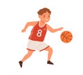 Boy, basketball player dribbling with ball. Child athlete in sportswear during sports activity. Happy active kid