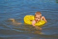 Boy bathes in the river