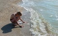 Boy bathes in the sea. Royalty Free Stock Photo