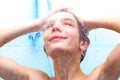 Boy bathing under a shower Royalty Free Stock Photo
