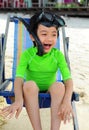 Boy on the beach with snorkeling gear Royalty Free Stock Photo
