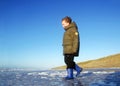 Boy at Beach in Winter Royalty Free Stock Photo