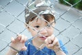 Boy behind bars Royalty Free Stock Photo