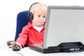 Boy behind a laptop Royalty Free Stock Photo