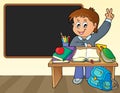 Boy behind school desk theme image 2 Royalty Free Stock Photo