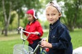 Boy on a bicycle in the green park Royalty Free Stock Photo