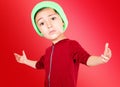 Boy with big head looking aggressive with his arms open Royalty Free Stock Photo