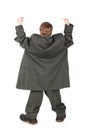 Boy in big man's suit and boots from back Royalty Free Stock Photo