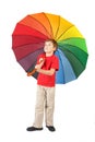 Boy with big multicolored umbrella on white