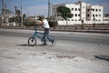 Boy and bike. Azaz, Syria.