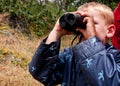 Boy with binoculars Royalty Free Stock Photo