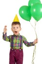 Boy with birthday cap and balloons