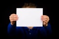 Boy with blank white sign Royalty Free Stock Photo