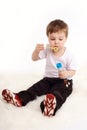 Boy blowing bubbles Royalty Free Stock Photo