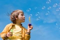 Boy blowing bubbles Royalty Free Stock Photo