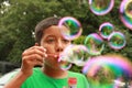 A boy blowing bubbles Royalty Free Stock Photo