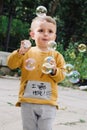 Boy blowing bubbles Royalty Free Stock Photo